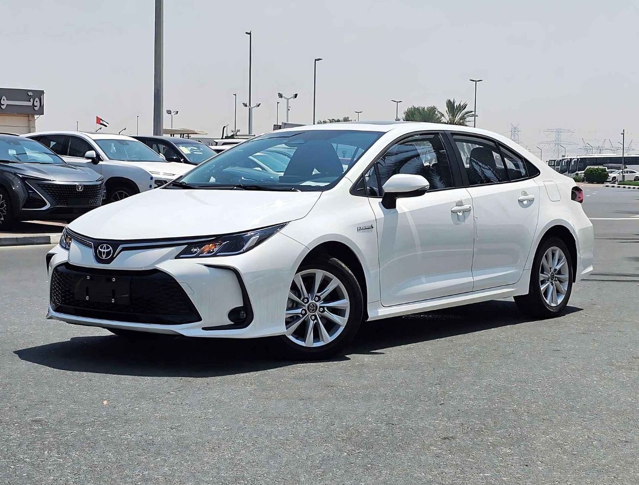 تويوتا كورولا ELITE / HYBRID / 1.8L / PUSH START, SUNROOF, DVD + CAMERA (CODE #67994)