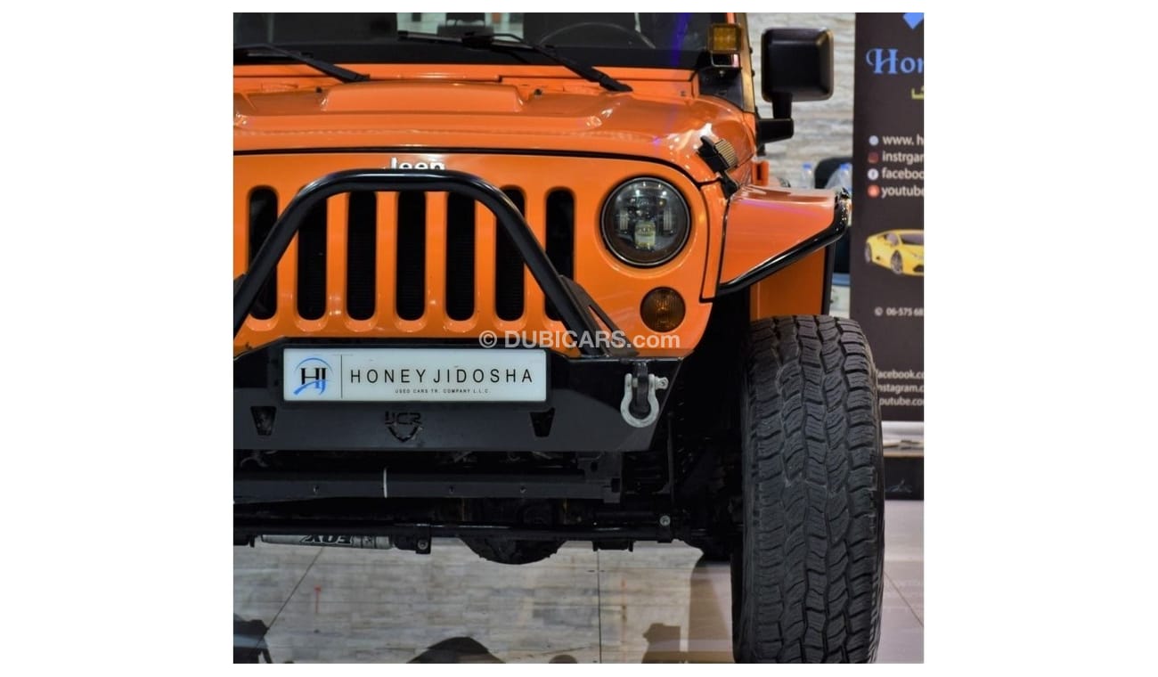Jeep Wrangler EXCELLENT DEAL for our Jeep Wrangler SAHARA 2013 Model!! in Orange Color! GCC Specs