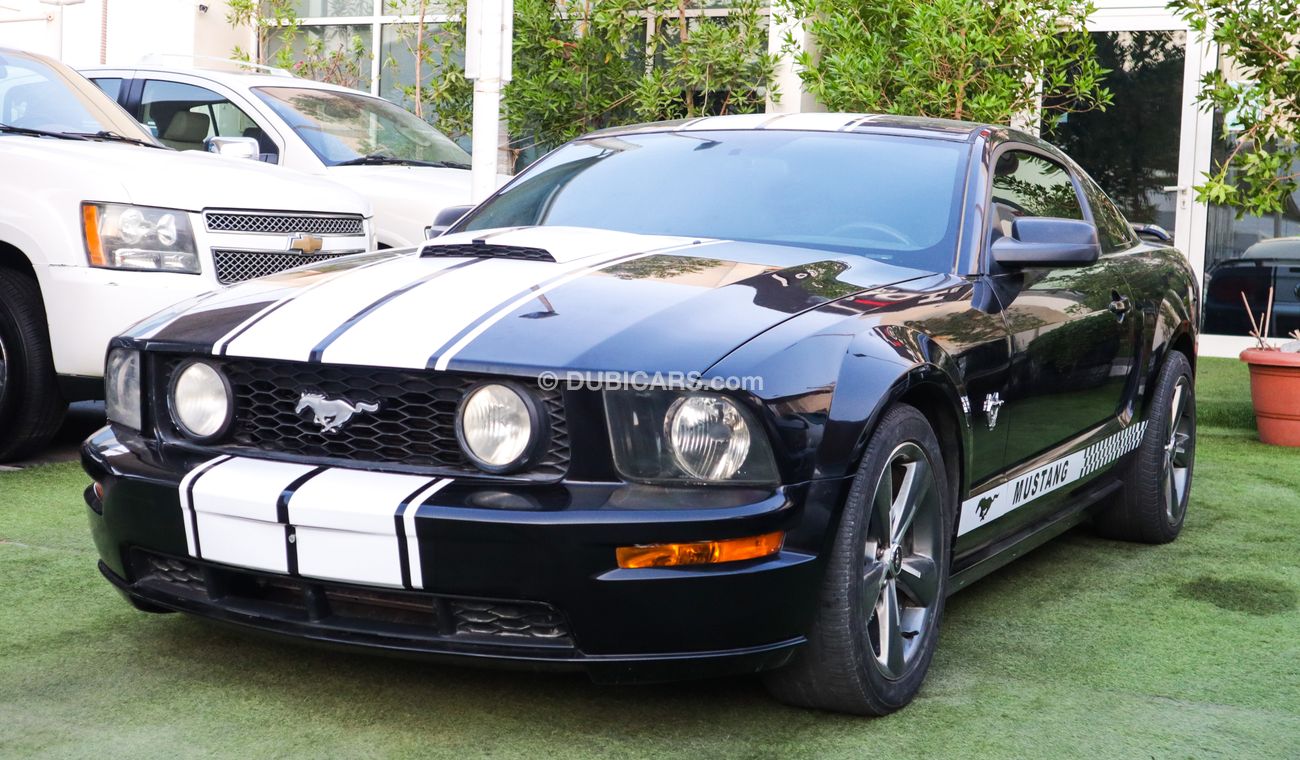 فورد موستانج خليجى كوبيه موديل 2009 لون أسود بحالة ممتازة لاتحتاج لأى مصاريف