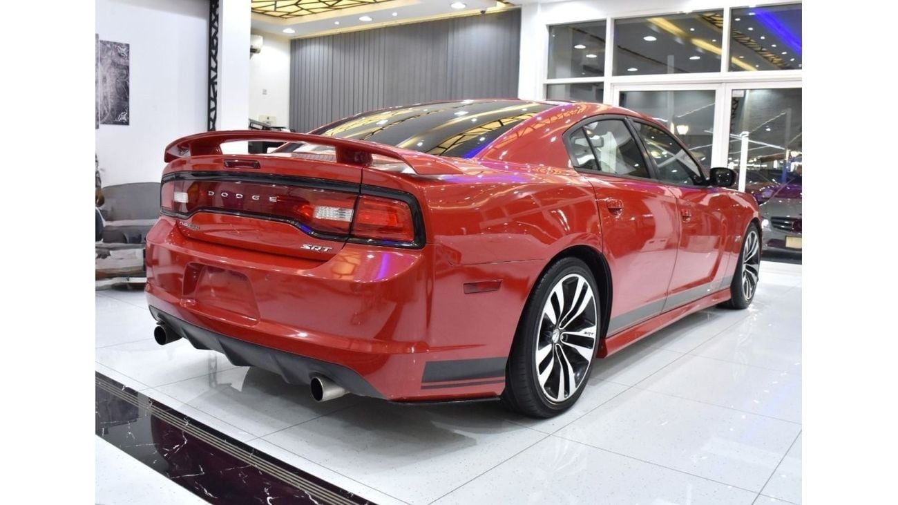 Dodge Charger EXCELLENT DEAL for our Dodge Charger SRT8 6.4 HEMI ( 2014 Model ) in Red Color GCC Specs