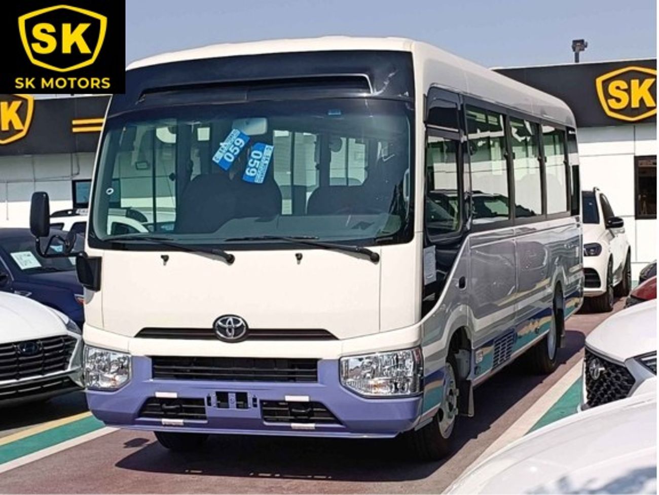 Toyota Coaster 4.2L V6 DIESEL / 23 STR M/T / AUTO DOOR /  LUGGAGE RACKS (CODE # CD42B)