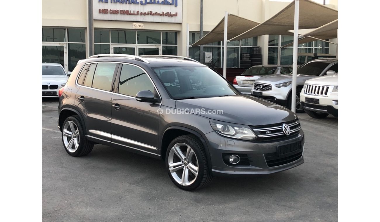 فولكس واجن تيجوان موديل 2014 خليجي فل مواصفات كراسي جلد ومثبت سرعه وتحكم كهربي كامل ونظام صوت ممتاز وكاميرا خلفيه