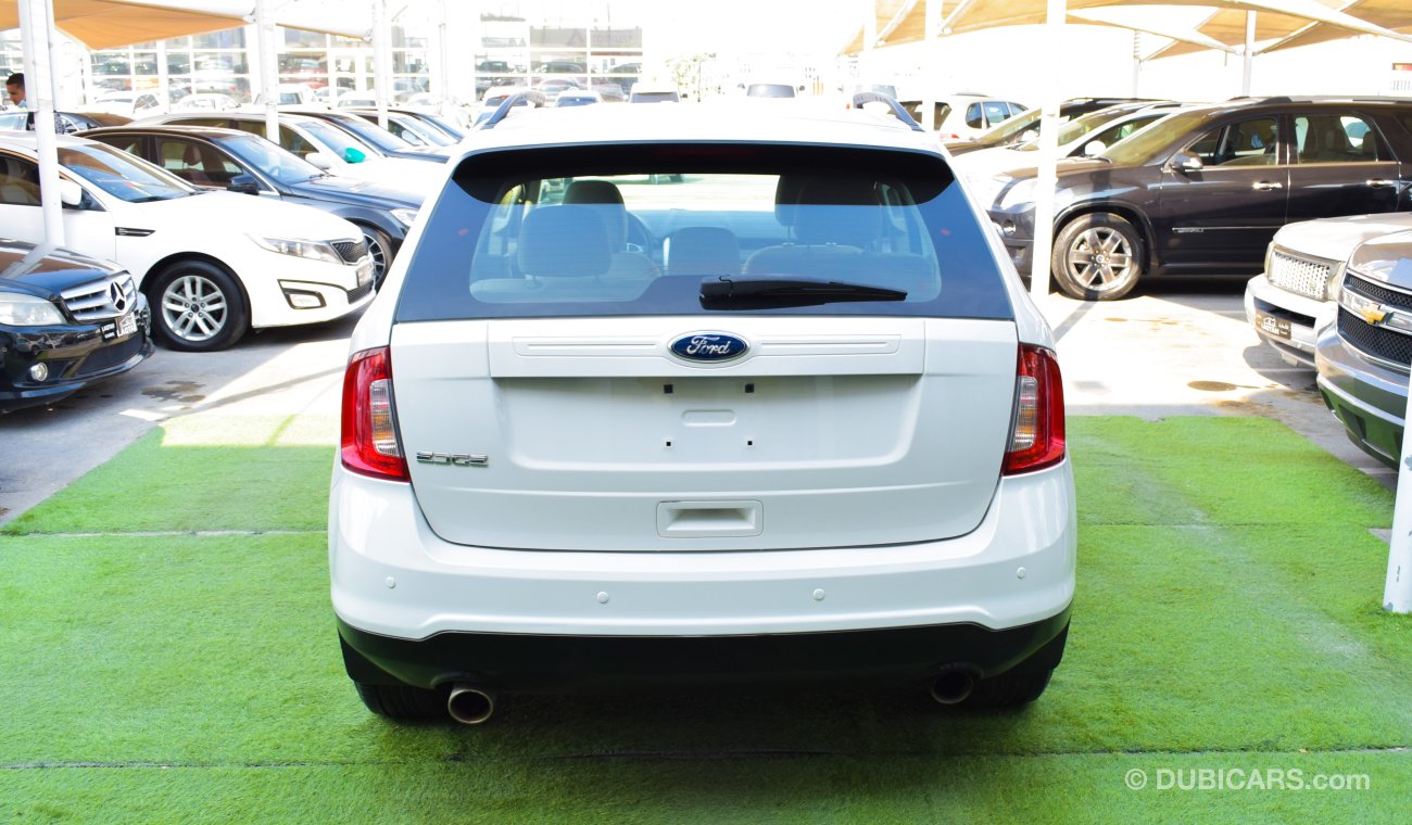 Ford Edge GCC model 2013, white color, inside beige No.2 agency dye, alloy wheels, sensors, cruise control, re