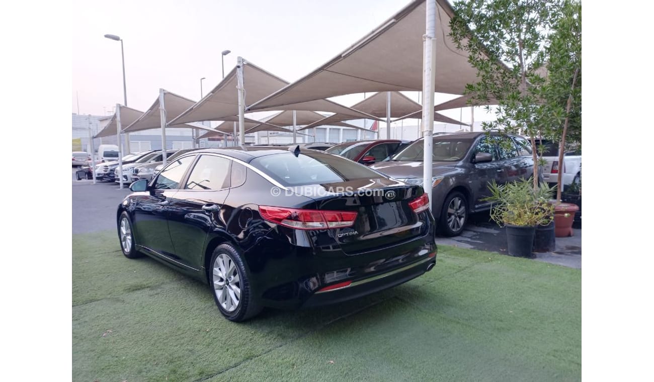 كيا أوبتيما وارد2016 رقم 2 رنجات  حساسات رنجات ومثبت سرعه وكاميرا خلفيه لاتحتاج الي مصاريف بحالة ممتازة