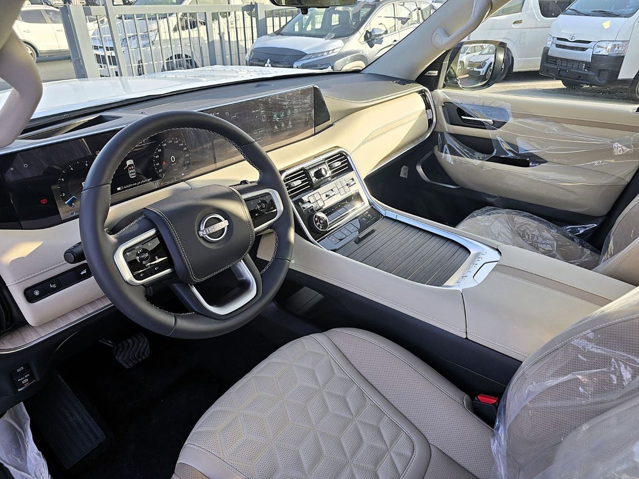 Nissan Patrol LE PLATINUM CITY Nissan patrol platinum full option 3.5l T A/T V6  4WD Gcc black color inside beige