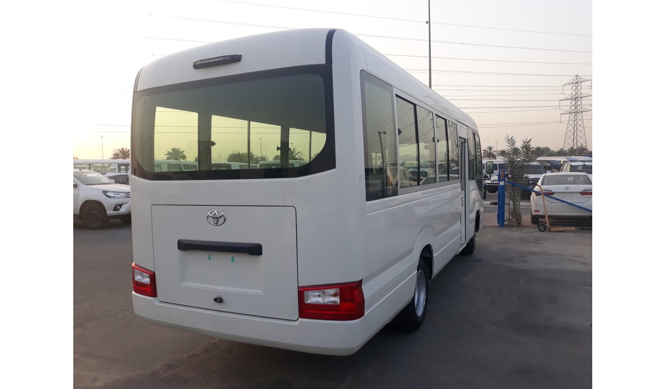 Toyota Coaster DIESEL 4.2L WITH AIR BAGS ABS AND POWER DOOR