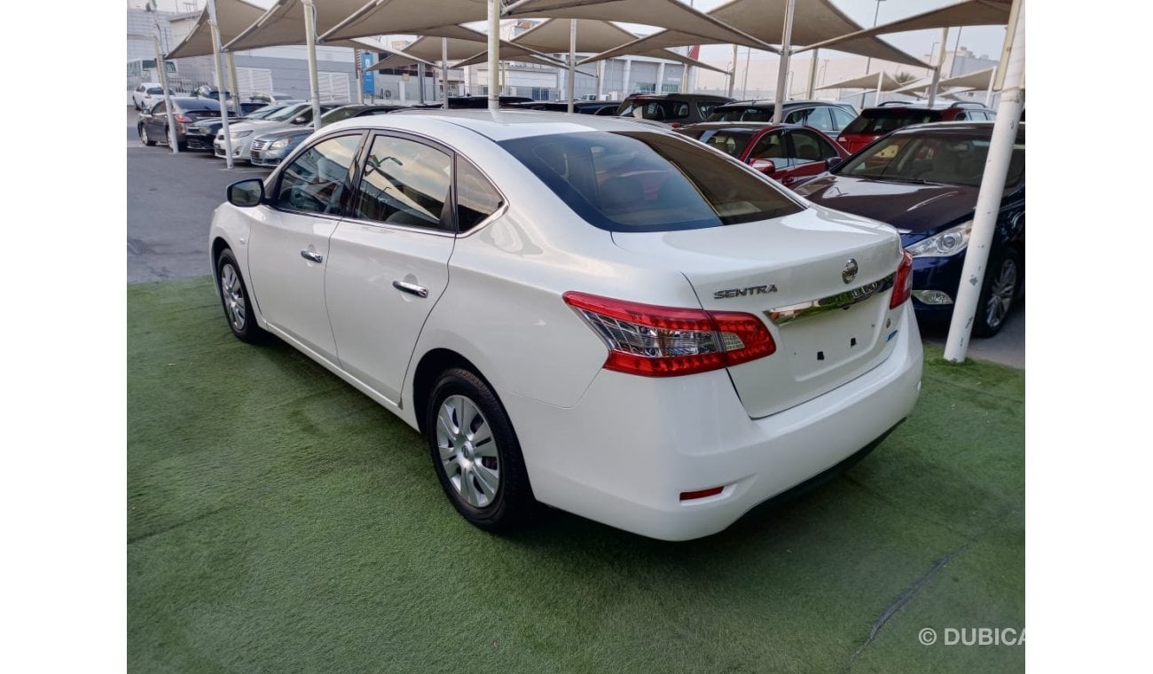 Nissan Sentra GCC model 2016 without accidents, white color, beige interior, Android screen, rear camera, in excel