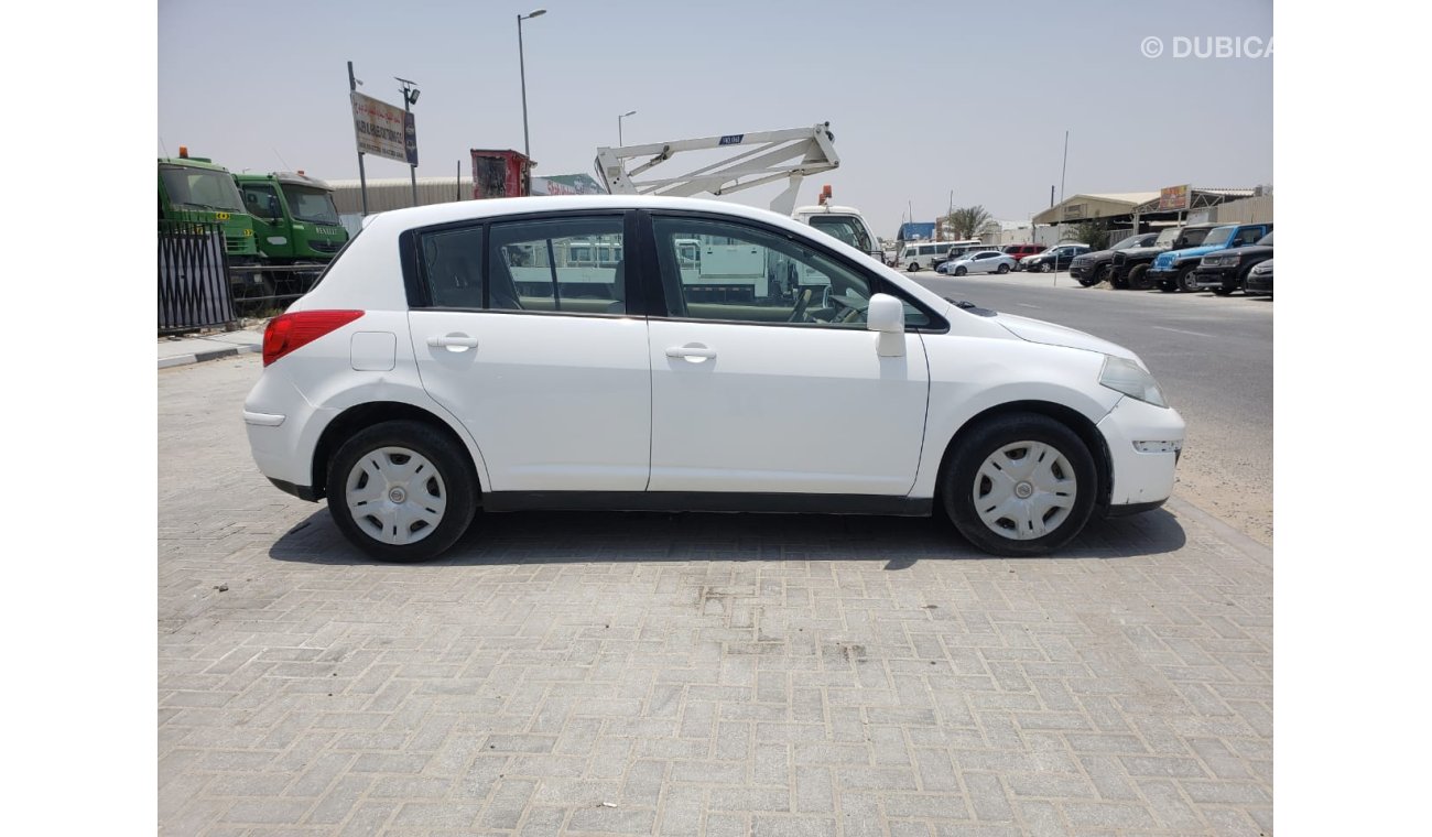 Nissan Tiida LOT: 135 AUCTION DATE: 7.8.21