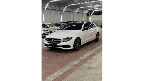 Mercedes-Benz E300 2.0L  4 turbo DOHC 16-valve