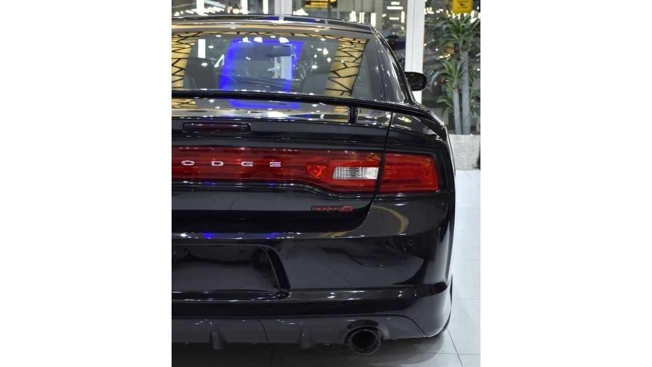 Dodge Charger EXCELLENT DEAL for our Dodge Charger SRT8 ( 2013 Model ) in Black Color GCC Specs