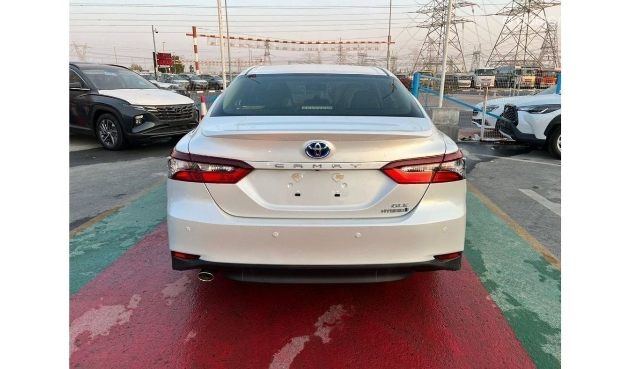 تويوتا كامري 2023 GLE (( Hybrid )) White color , 2.5L 4cyl Petrol, A/T, FWD