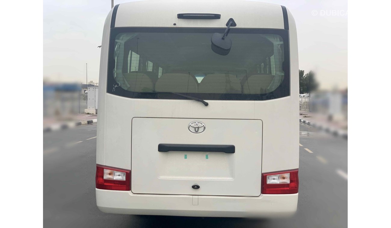 Toyota Coaster FULL OPTION — V6 — 4200cc — DIESEL—22 SEAT -- 3 POINT SEAT BILT - LUGGAGE RACK - CURTAINS - FRIDGE