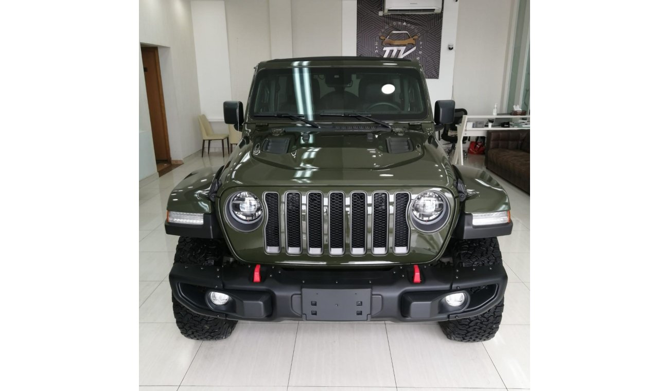 Used Rubicon JEEP WRANGLER RUBICON 2021 GREEN V4  L 14000 KM REAR  CAMERA BLACK LEATHER INTERIOR PAR 2021 for sale in Sharjah - 530200