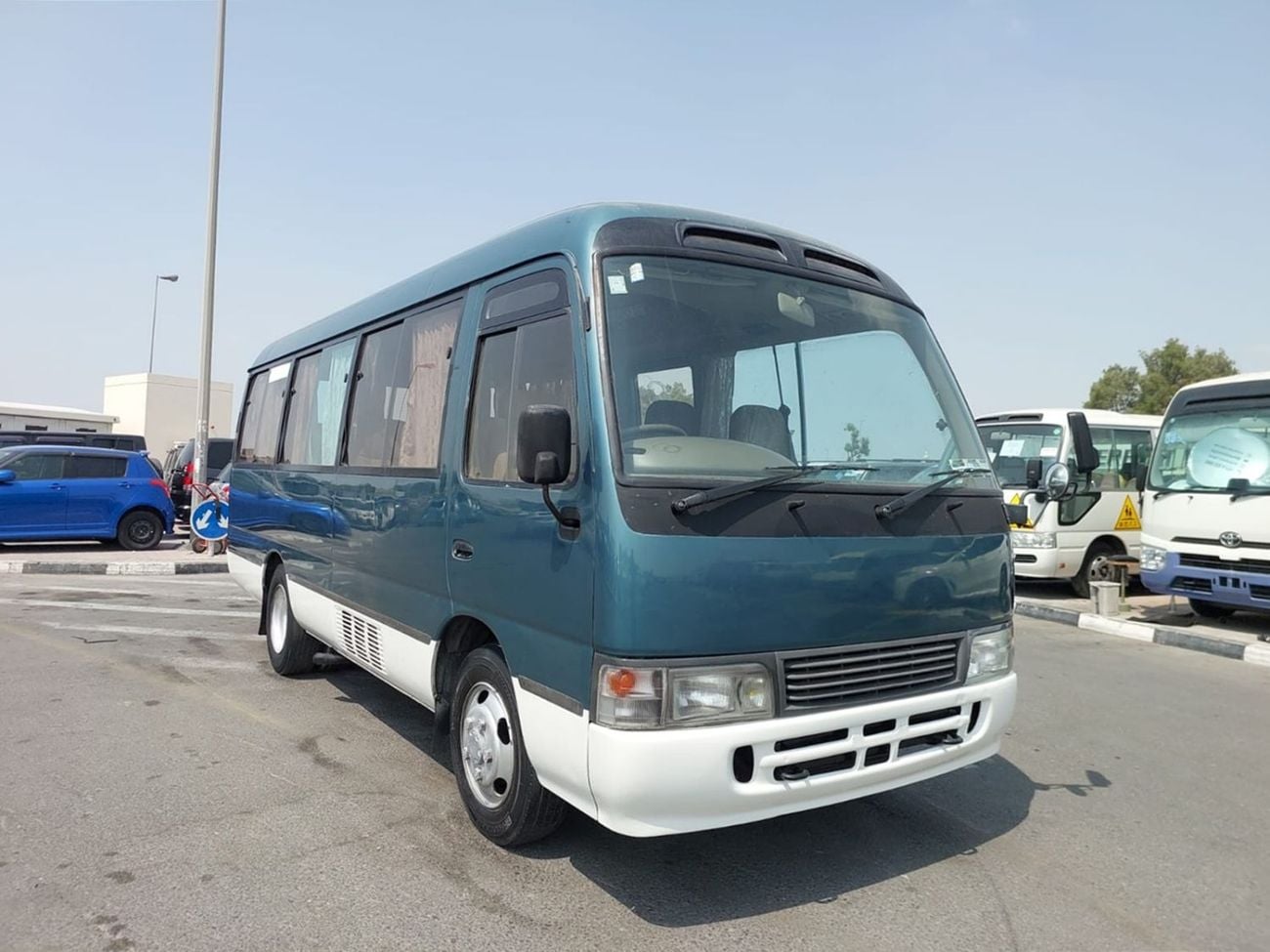 تويوتا كوستر (RAMADAN OFFER) TOYOTA COASTER BUS RHD 1996 MODEL 4.2 L DIESEL AUTOMATIC(PM01351)