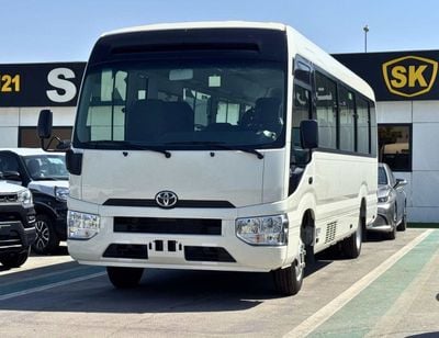 Toyota Coaster 4.2L DIESEL V6 4.2L V6 DIESEL / 23 STR M/T / AUTO FOLDING DOOR / REAR SEATS BELT (CODE # COD42A)