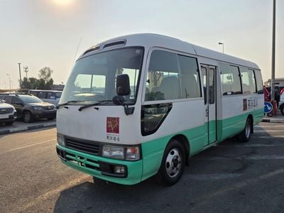 تويوتا كوستر TOYOTA COASTER BUS RHD 2003 MODEL 4.2 L DIESEL AUTOMATIC(PM12173)