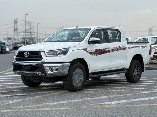 تويوتا هيلوكس 2.7L GLX-S FULL WITH WIRLESS CHARGER AND COMPRESSOR OMANI