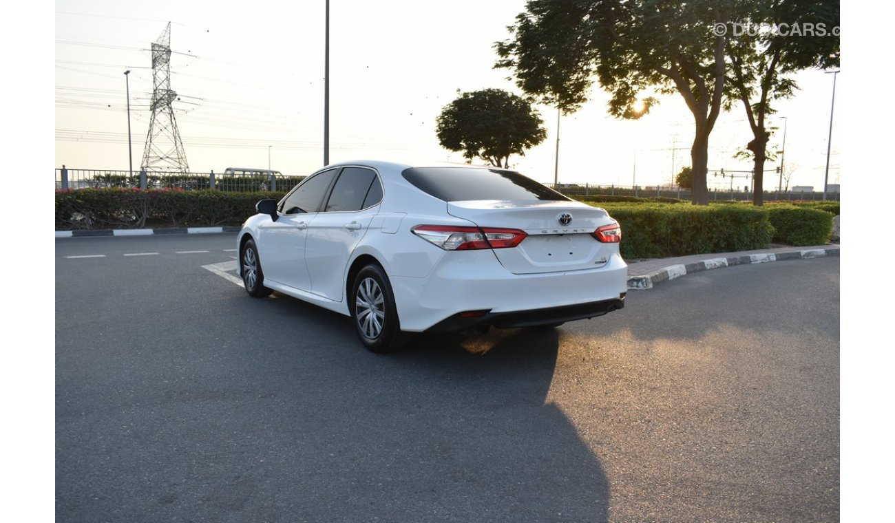 تويوتا كامري 2.5 L - LE Hybrid - 2019 - WHT_GRY