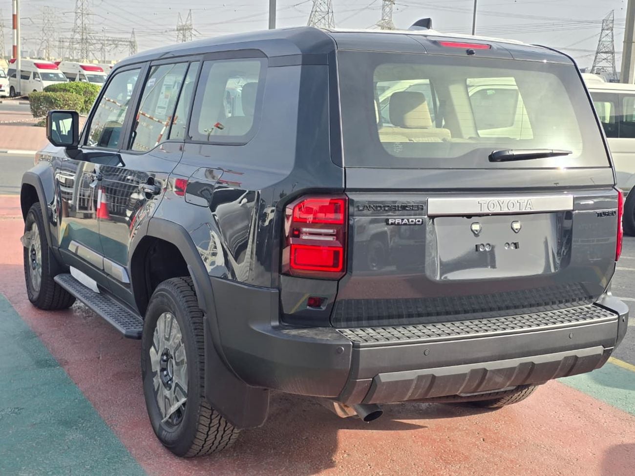 تويوتا برادو Toyota land Cruiser prado  MID 2.4l petrol Turbo A/T SUV 4WD  grey color 2026 model