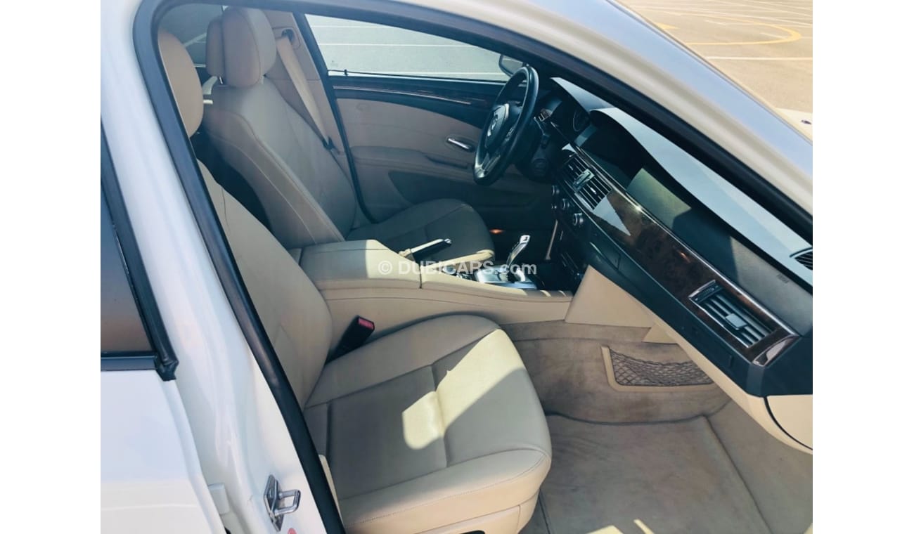 BMW 523i Model 2010 GCC car perfect condition inside and outside full option sun roof leather seats back came