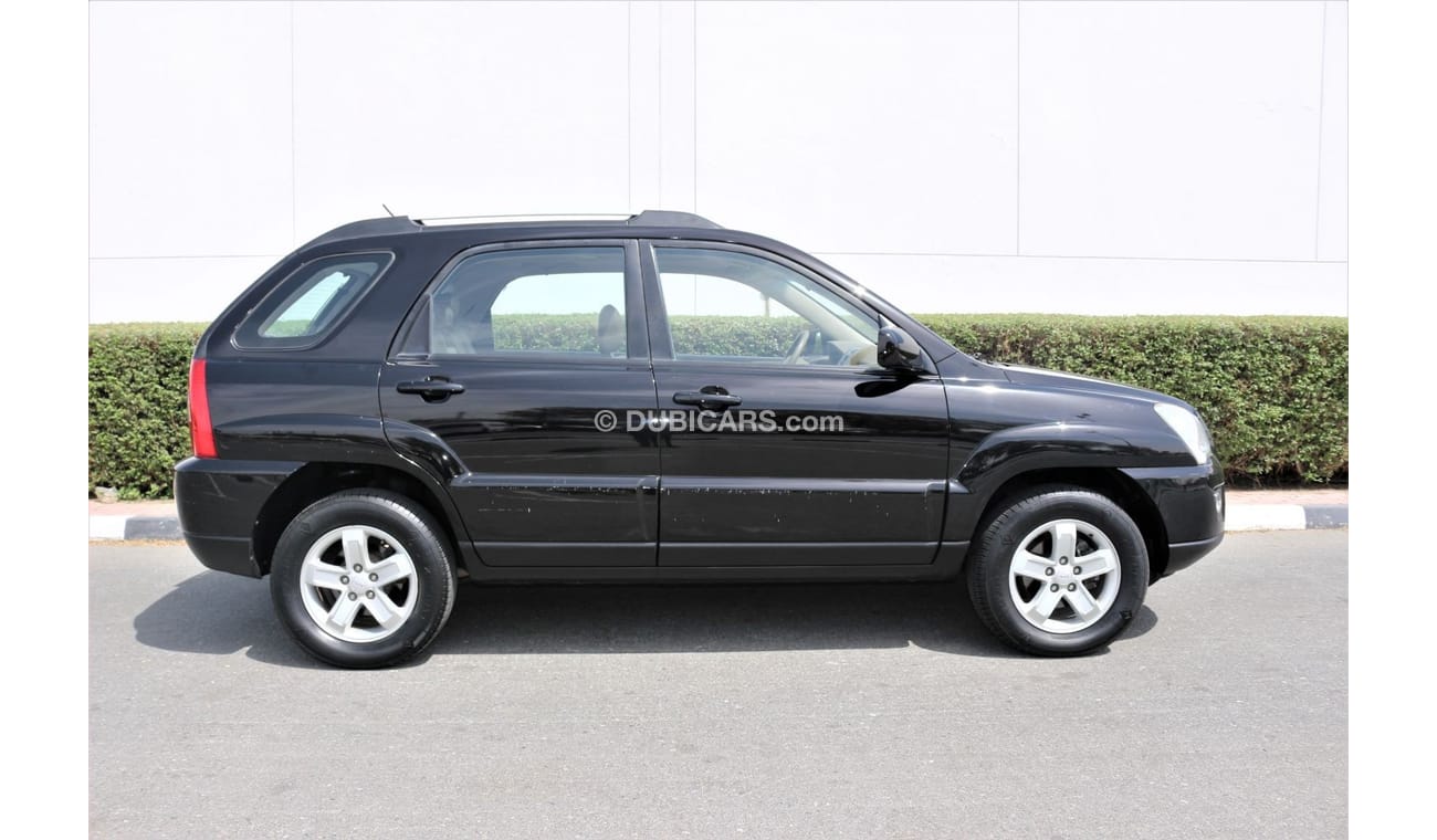 كيا سبورتيج كيا سبورتاج 2009 خليجي فل اوبشن جلد و فتحه فورويل 2700 سي سي