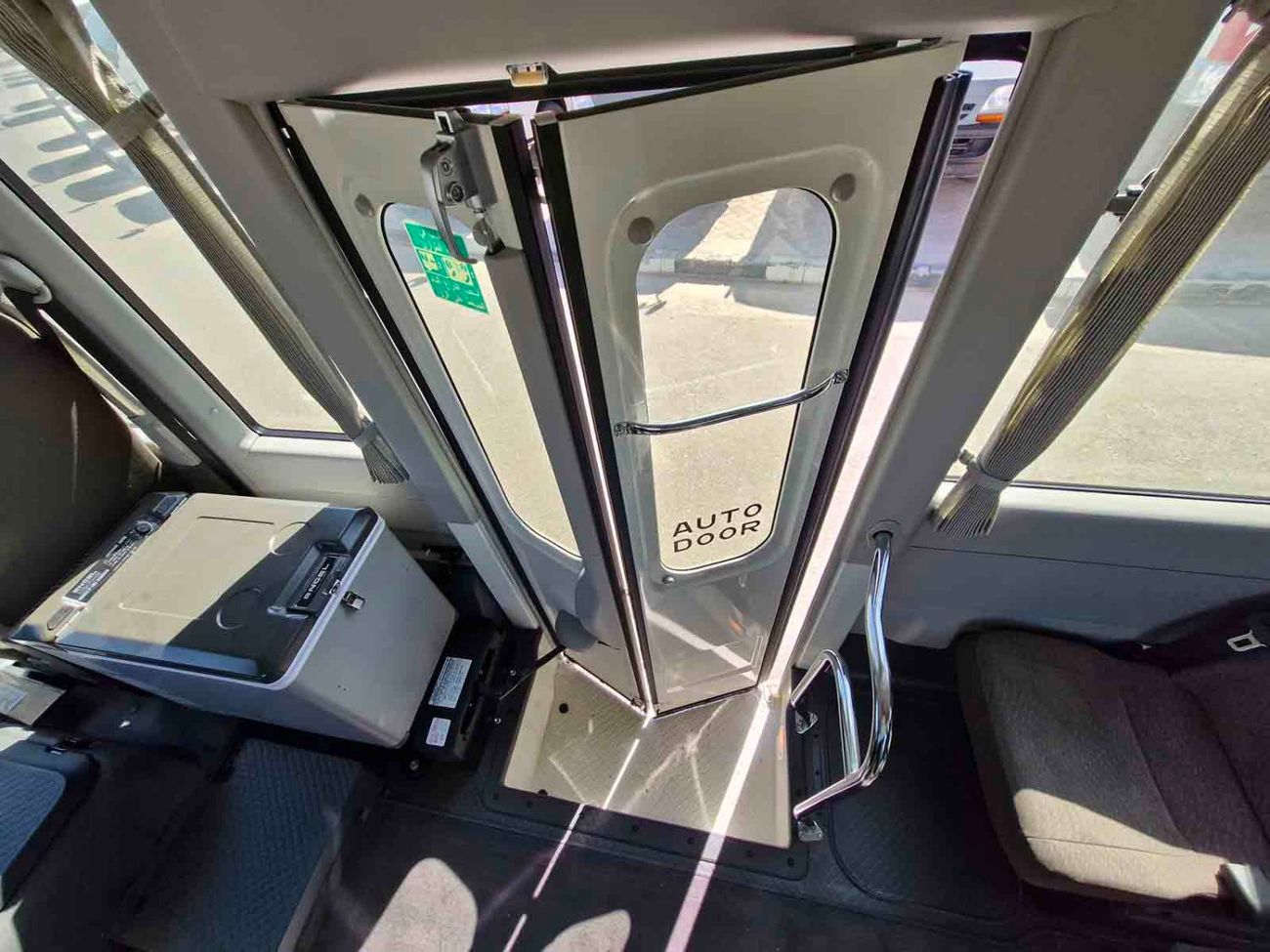 تويوتا كوستر ECTALM003 - 2025 Toyota Coaster – 2.8L Diesel Auto – 22 Seats, Cool Box