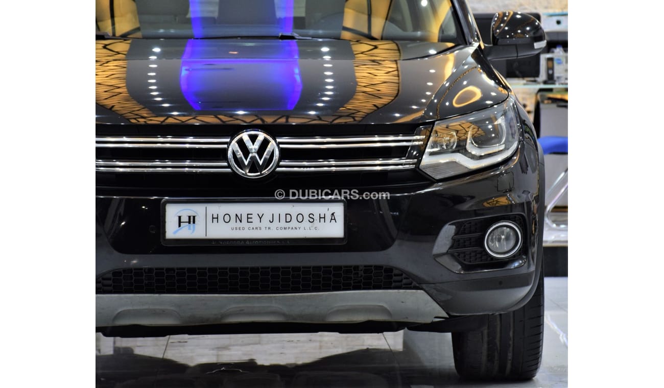 Volkswagen Tiguan SEL EXCELLENT DEAL for our Volkswagen Tiguan 2.0 TSi 4Motion ( 2014 Model! ) in Black Color! GCC Spe