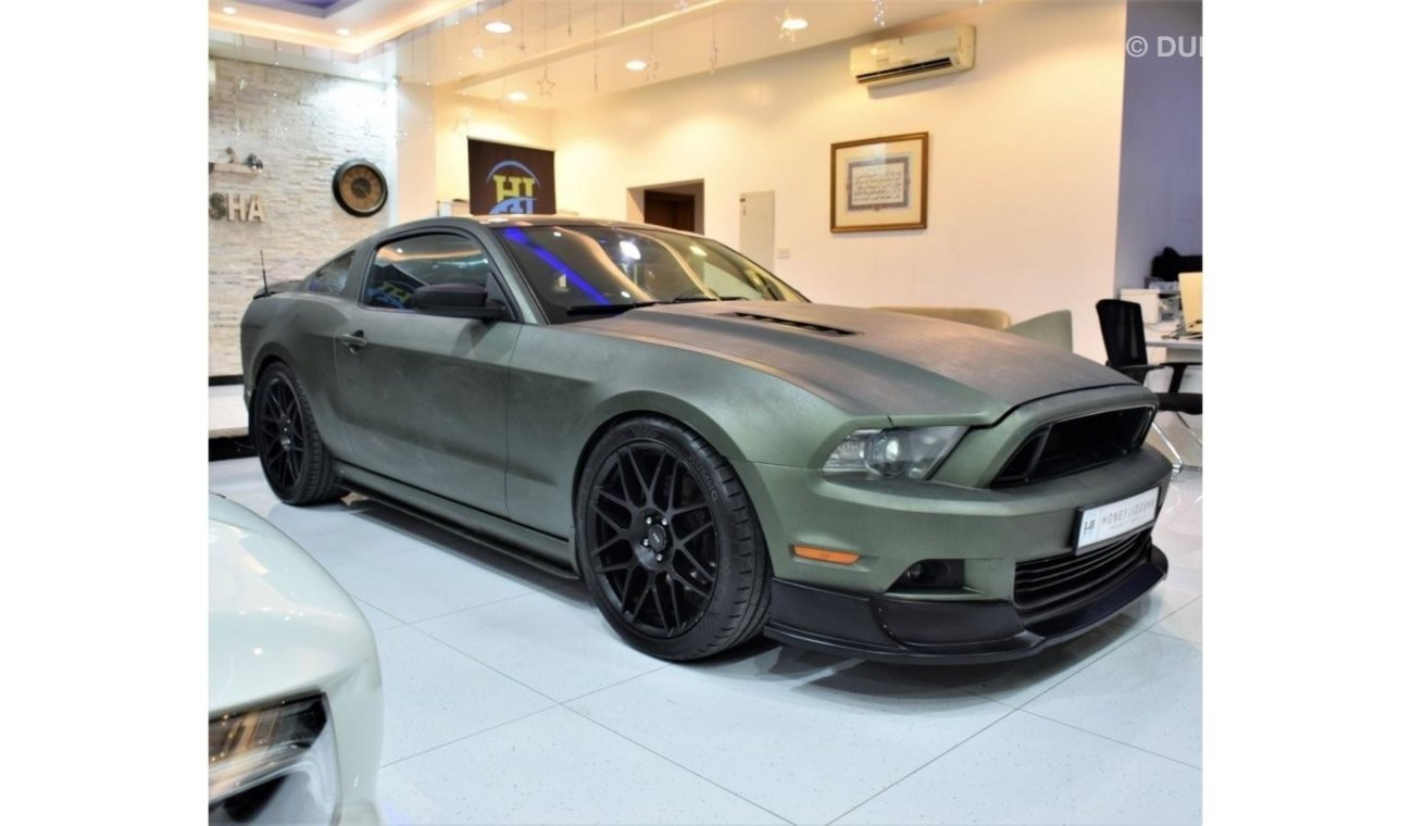 Ford Mustang EXCELLENT DEAL for our Ford Mustang 5.0 GT 2013 Model!! in Crinkled Green Color! GCC Specs