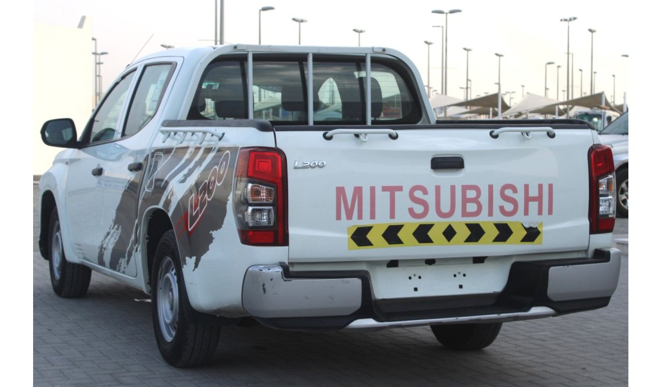 Mitsubishi L200 MITSUBISHI L200 WHITE GCC EXCELLENT CONDITION WITHOUT ACCIDENT