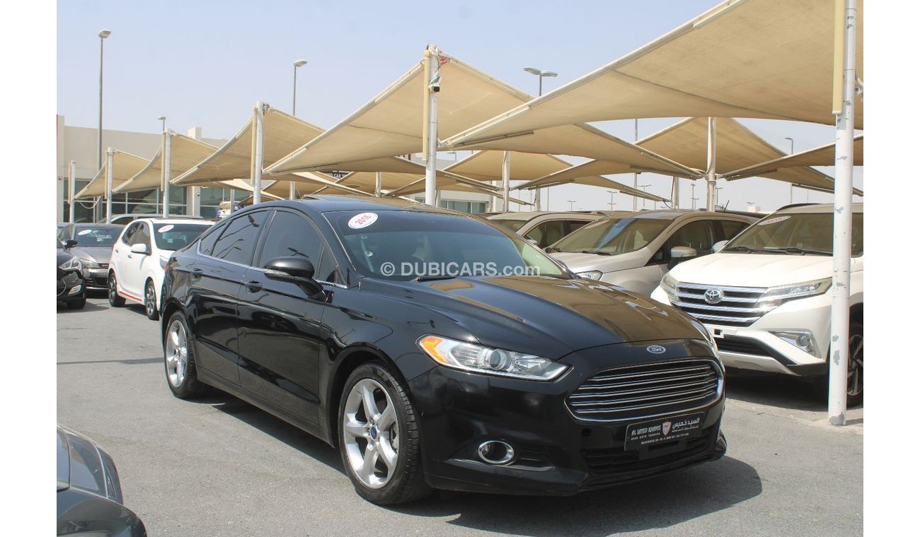 Ford Fusion SEL ACCIDENTS FREE- ORIGINAL PAINT - GCC - SUNROOF - CAR IS IN PERFECT CONDITION INSIDE OUT - GCC