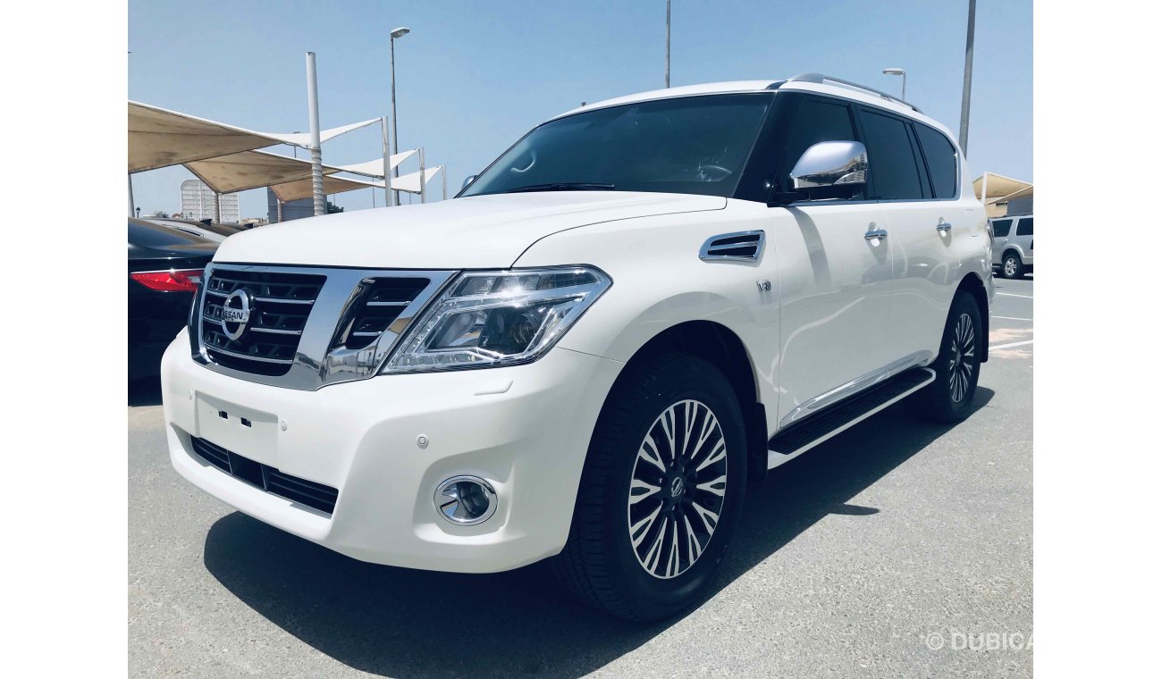 Nissan Patrol فل ابشن ماكينه كبيره صبغة وكاله تشيكات وكاله داخل الضمان بحاله ممتاذه