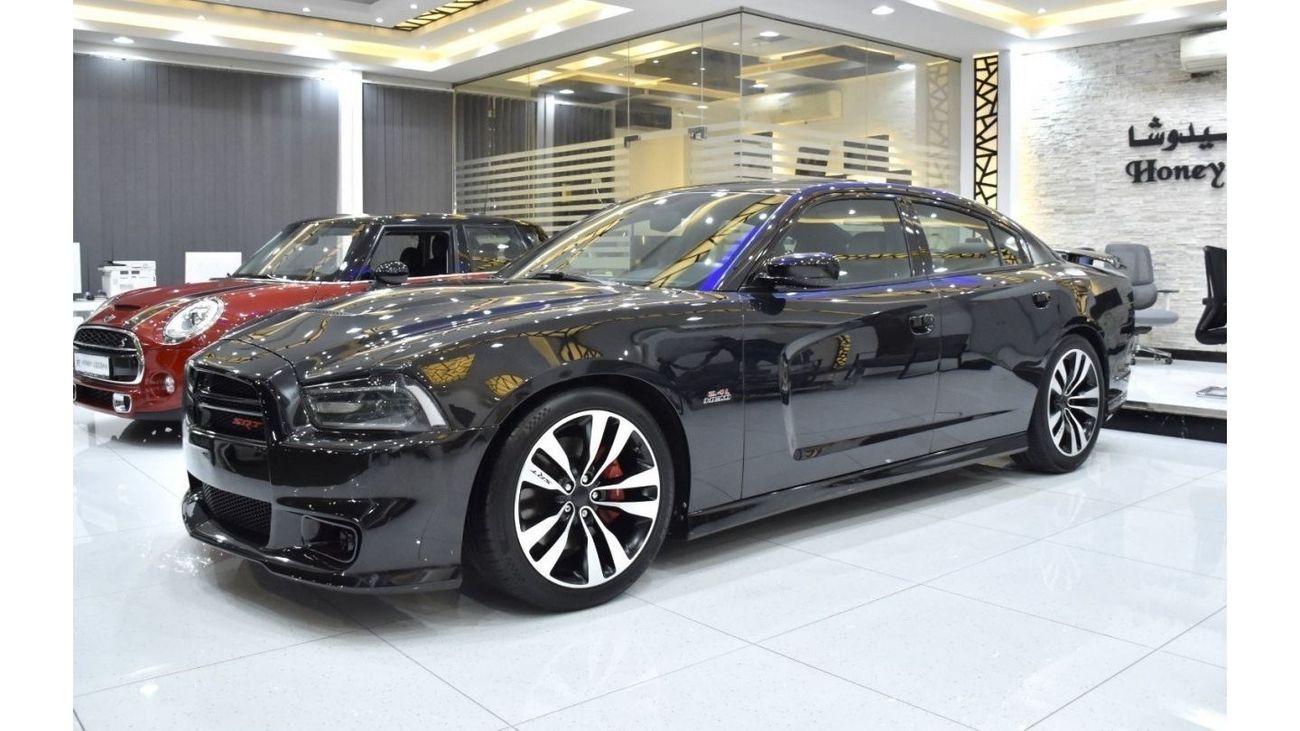 Dodge Charger EXCELLENT DEAL for our Dodge Charger SRT8 ( 2013 Model ) in Black Color GCC Specs