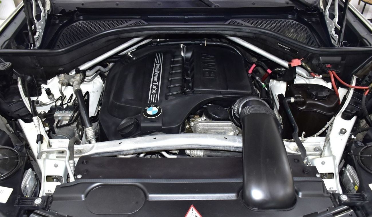 BMW X5 35i EXCLUSIVE EXCELLENT DEAL for our BMW X5 xDrive35i ( 2014 Model ) in White Color GCC Specs