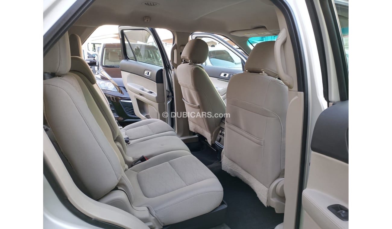 Ford Explorer 2014 model GCC, camera screen, cruise control, wheels, sensors, rear spoiler, in excellent condition