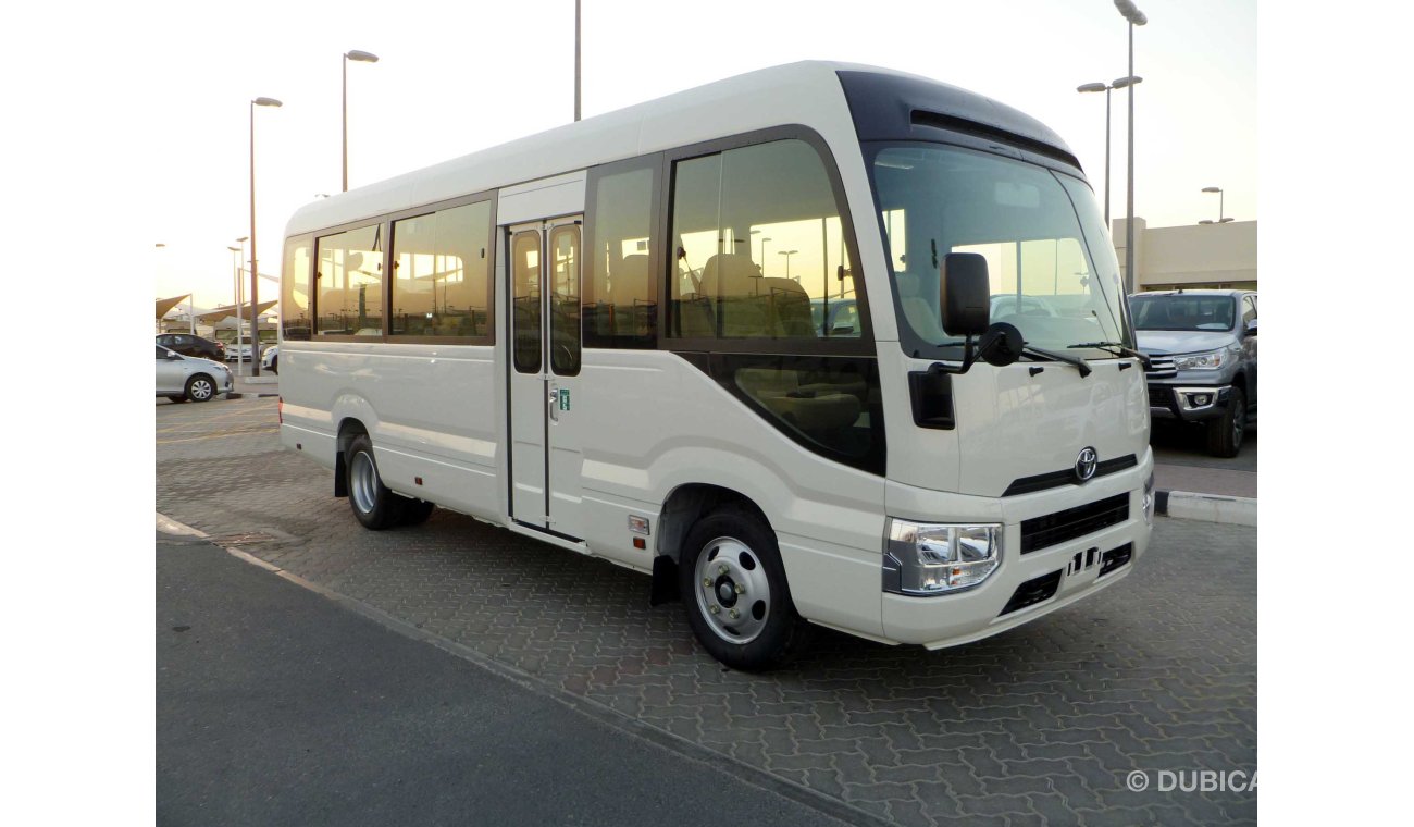 Toyota Coaster LHD -  4.2L DIESEL HIGH ROOF DSL MANUAL