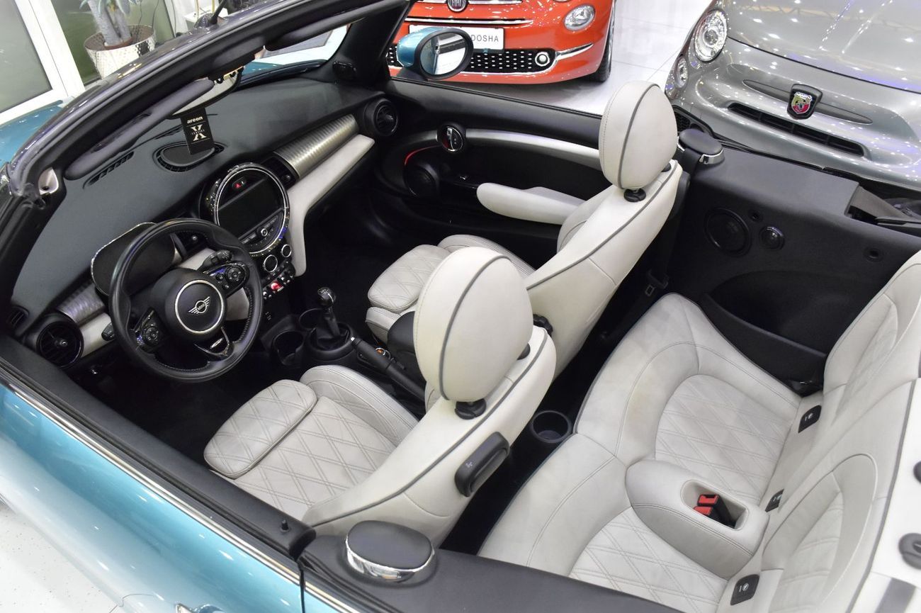 Mini Cooper Cabrio EXCELLENT DEAL for our Mini Cooper Cabrio ( 2021 Model ) in Blue Color American Specs