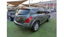 Nissan Murano Model 2008, gray color, number one, leather hatch, wing installer, in excellent condition, you do no