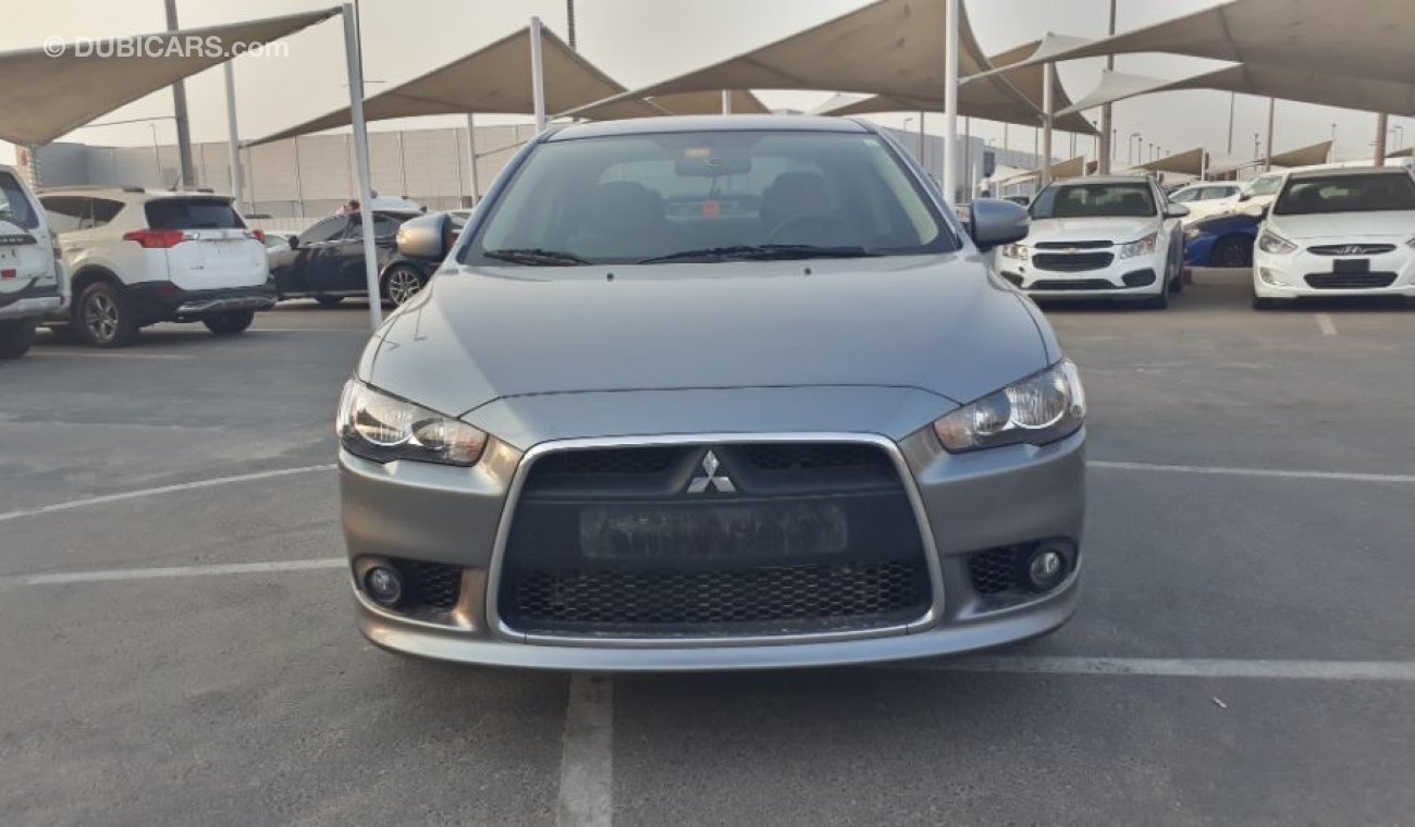 Mitsubishi Lancer السيارة نظيفه جدا بحاله ممتازه بدون حوادث ضمان شاسيه جير ماكينه