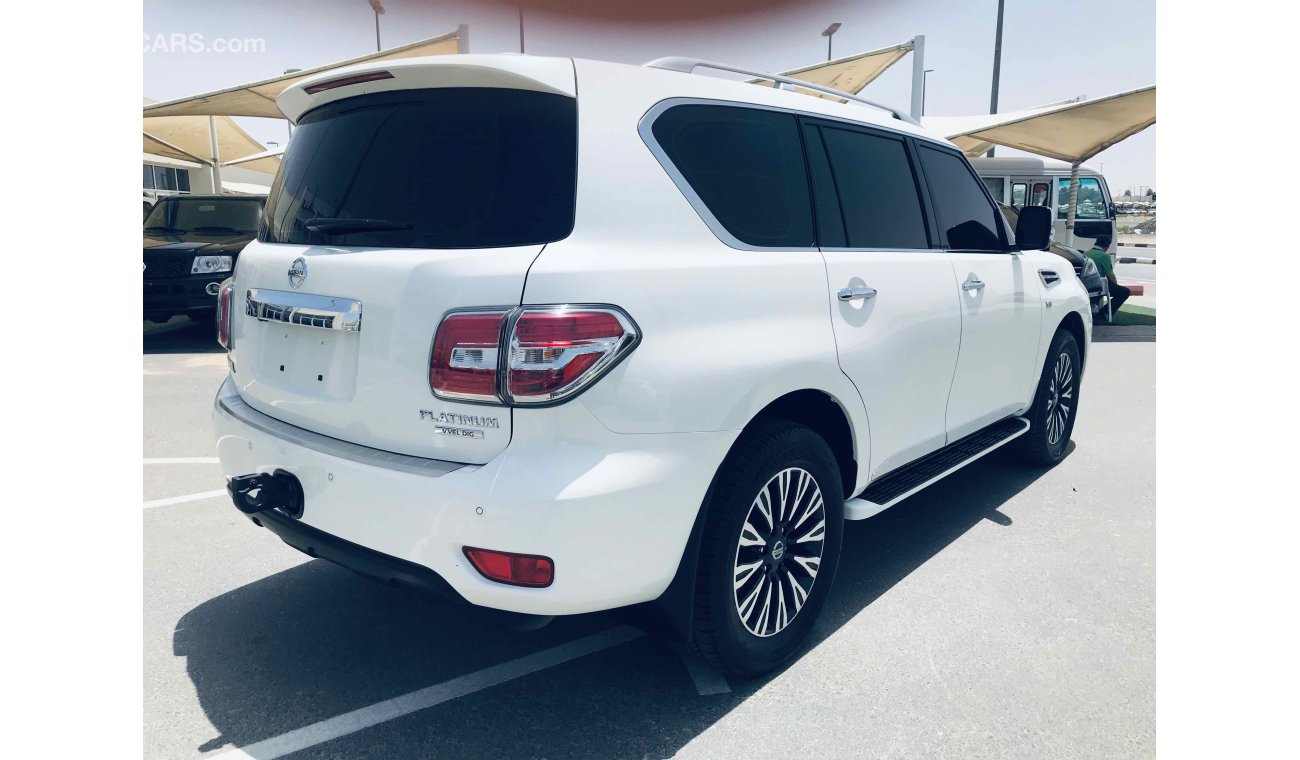 Nissan Patrol فل ابشن ماكينه كبيره صبغة وكاله تشيكات وكاله داخل الضمان بحاله ممتاذه