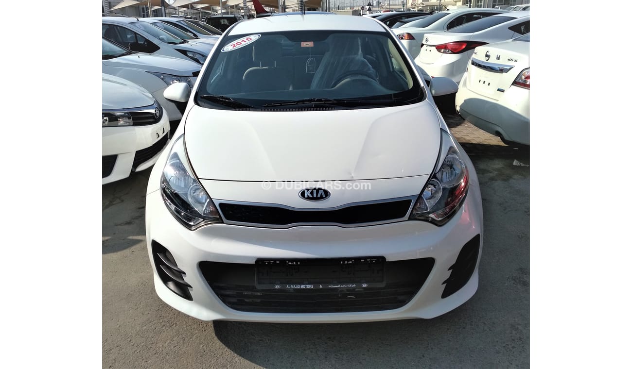 Kia Rio WHITE 2015 GCC NO PAINT NO ACCIDENT PERFECT