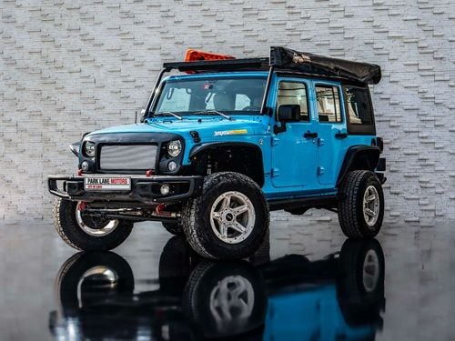 Jeep Wrangler Unlimited Sport 3.6L A/T