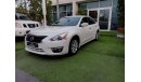 Nissan Altima 2014 model, camera screen, electric chair, electric mirrors, white inside black, in very excellent c