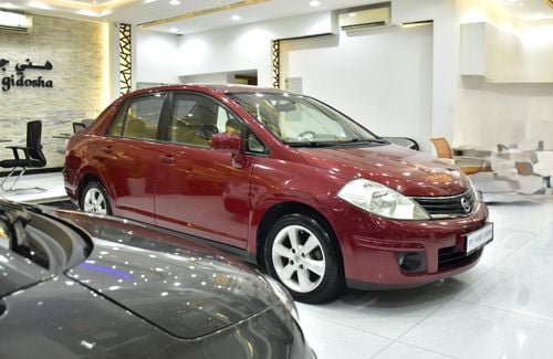 نيسان تيدا EXCELLENT DEAL for our Nissan Tiida 1.8 ( 2011 Model ) in Red Color GCC Specs