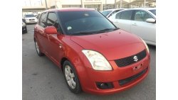 Suzuki Swift clean from the agency's first owner 2009 red color