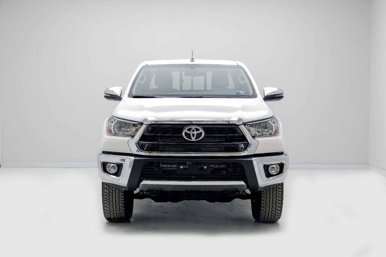 Toyota Hilux DLX 2.4L - Super White Inside Red | Export Only