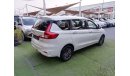 Suzuki Ertiga Gulf model 2019, agency dye, 1600 cc, imprint, white color, rear wing, alloy wheels, air conditionin