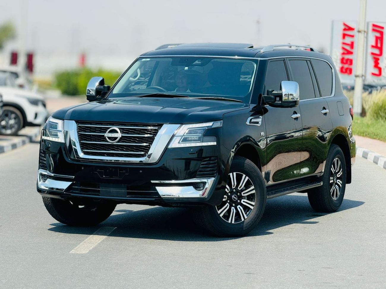 نيسان باترول Nissan patrol 2023 RHD black 7seaters petrol engine black colour outside and grey colour imterior