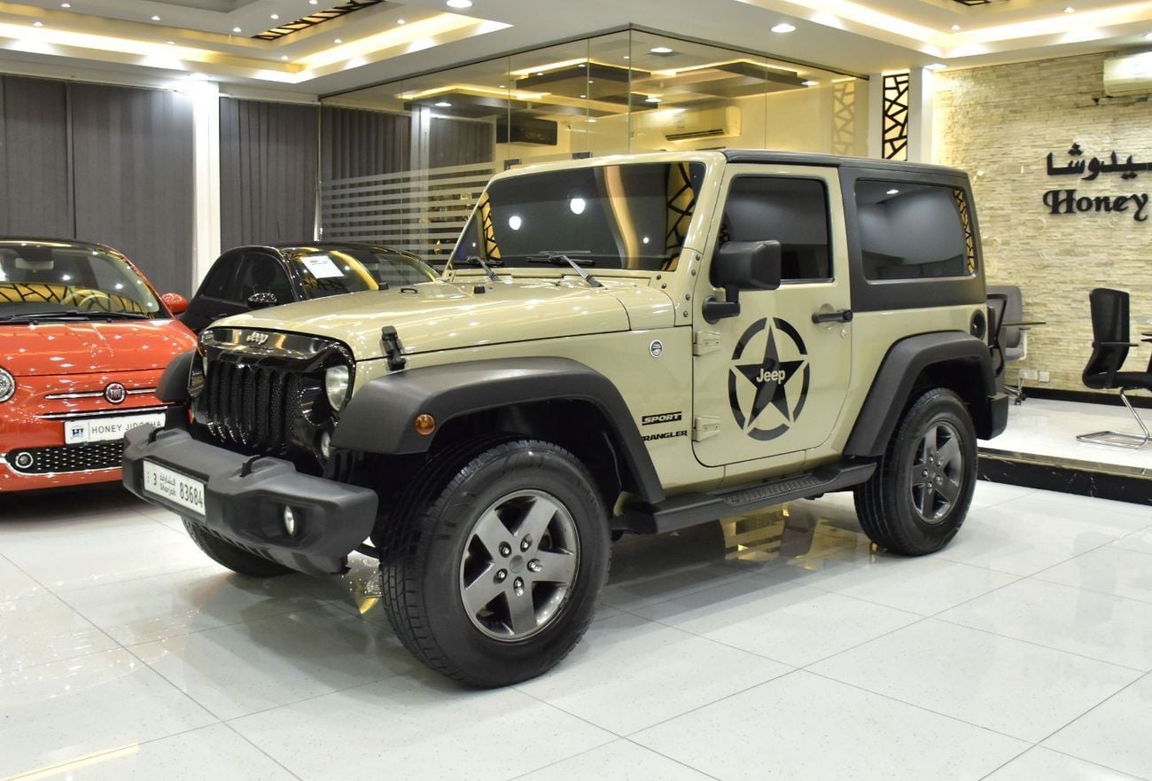 Jeep Wrangler SPORT EXCELLENT DEAL for our Jeep Wrangler Sport ( 2017 Model ) in Beige Color GCC Specs