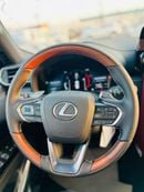 Lexus LX700h LAEXUS 700H SIGNATURE WITH AUTOPARK   ENGINE  : 3.5L   MODEL   : 2025 COLLAR  : WHITE  INTERIOR: RED
