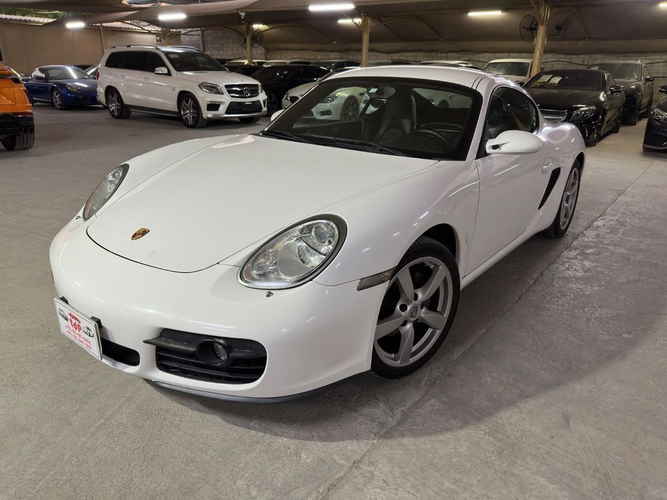 بورش كايمان PORSCHE CAYMAN 2008 2.7L | MANUAL TRANSMISSION | SPORTS STEERING WHEEL | HALF LEATHER SEATS